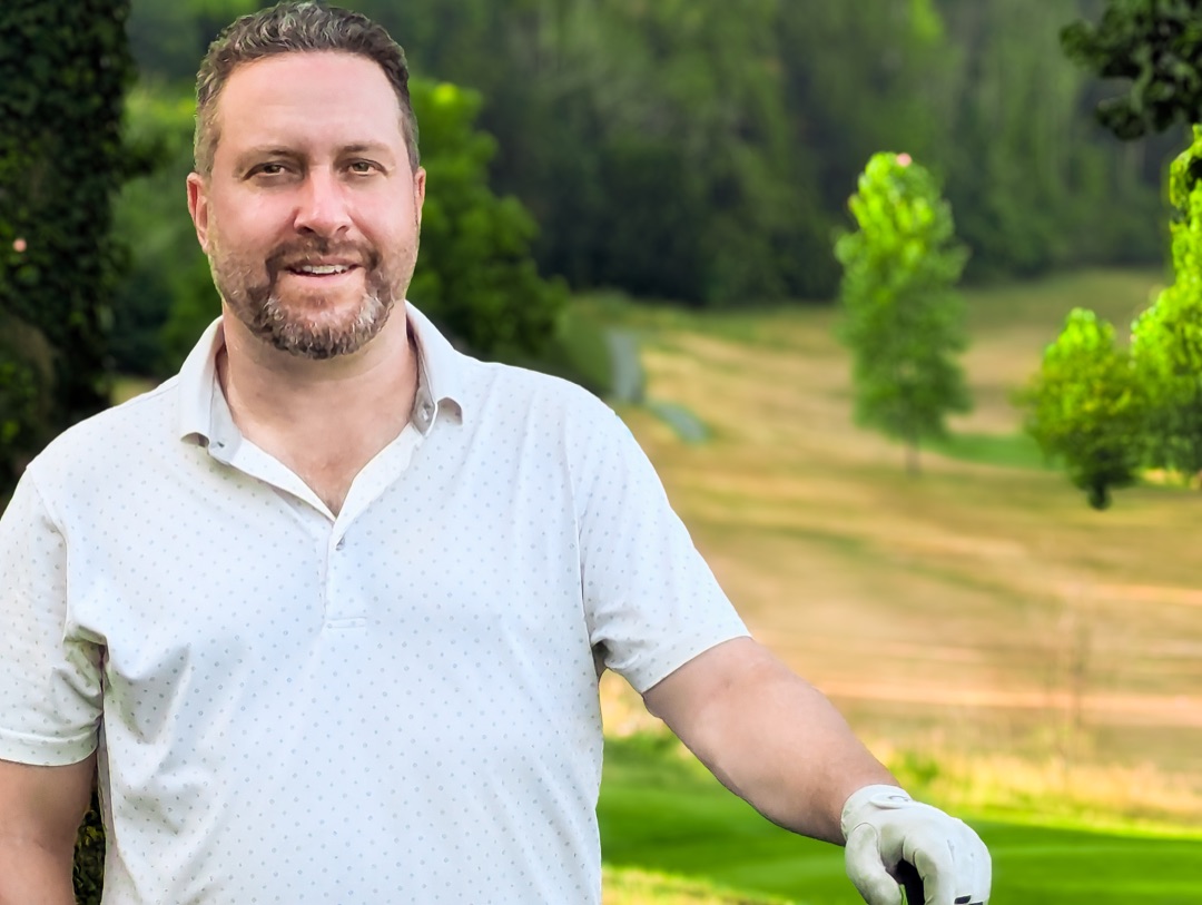 Volk Nezir, founder of RollupBandit, on a golf course